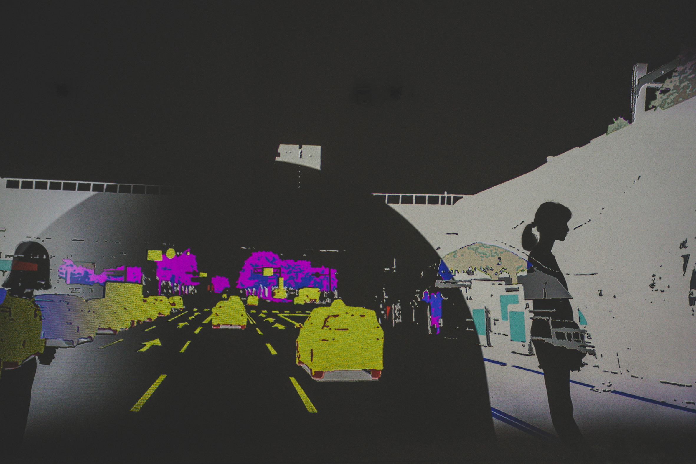 《你的城色》展覽內容中有各色分層的台中行車街景。